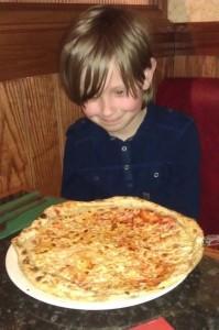 small boy large pizza