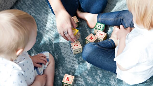 children playing with blocks together