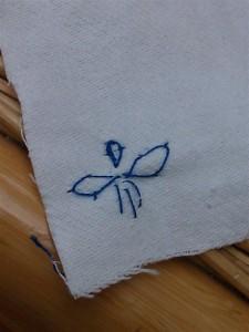 embroidered bird done in chain stitch Nazca peg doll