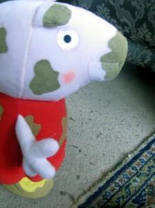 Peppa Pig jumps in muddy puddles