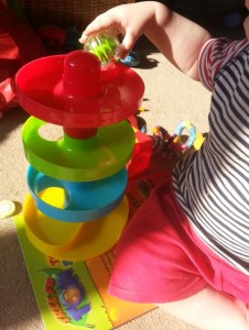 plastic helter skelter toy with large balls