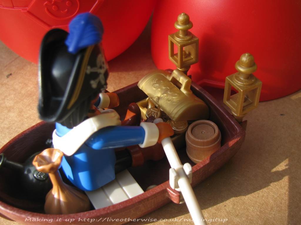 playmobil pirate in boat